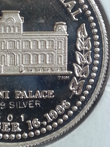 1986 proof strike with intials